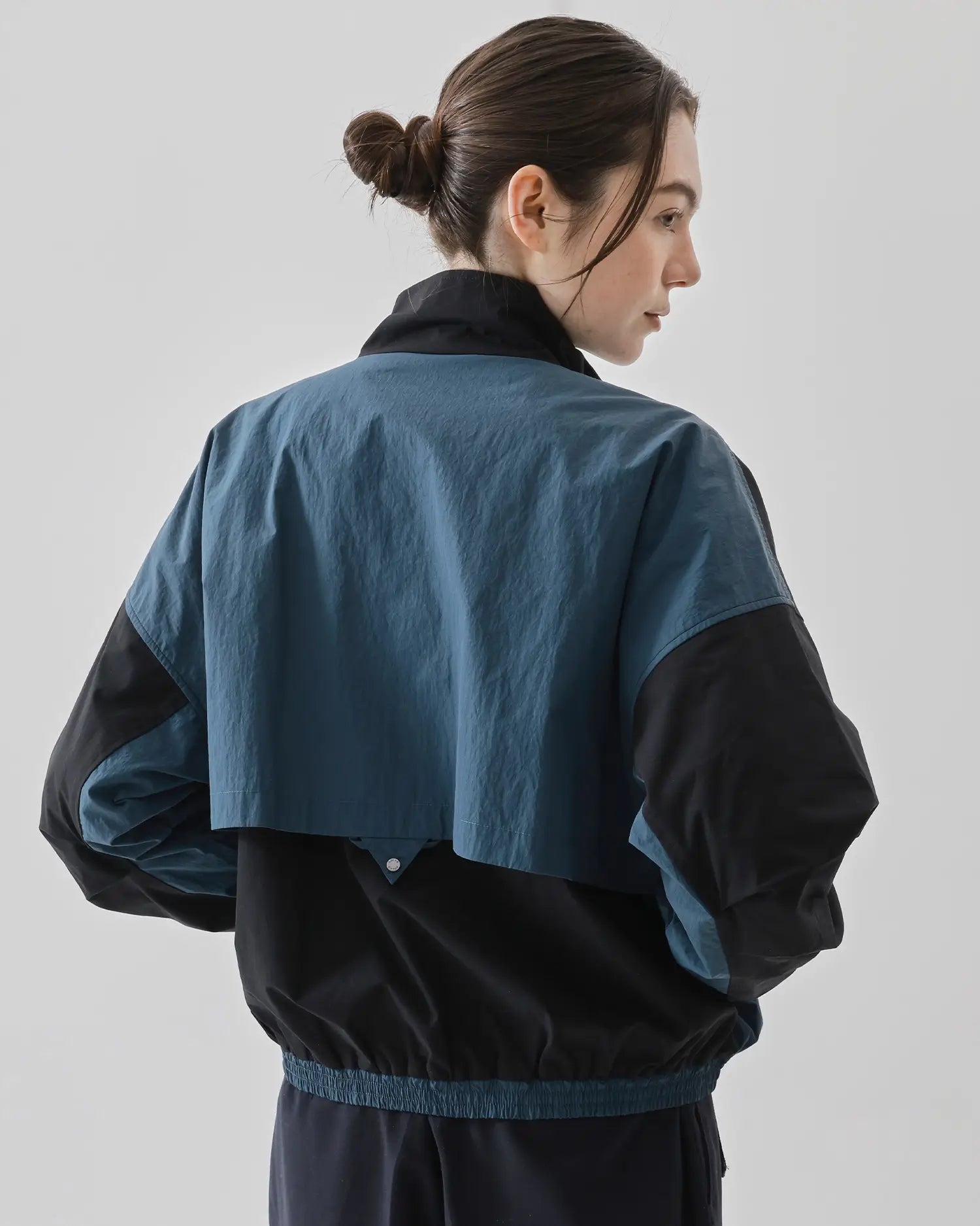 Shop Women's Cropped Track Jacket in Blue & Black | KOLAB Shop Women's Cropped Track Jacket in Blue & Black | KOLAB